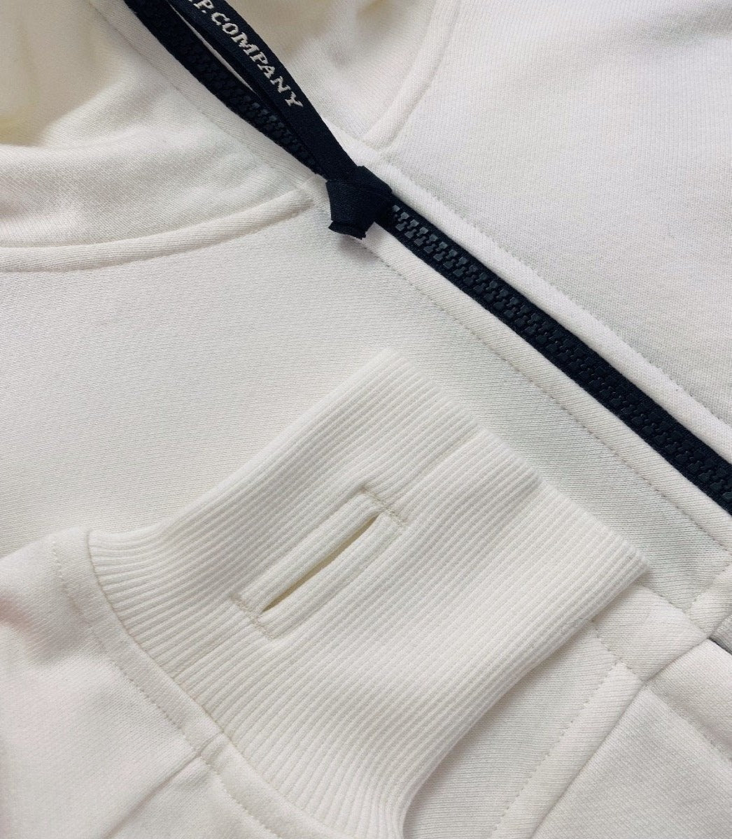 CP COMPANY CREAM ZIP HOODIE